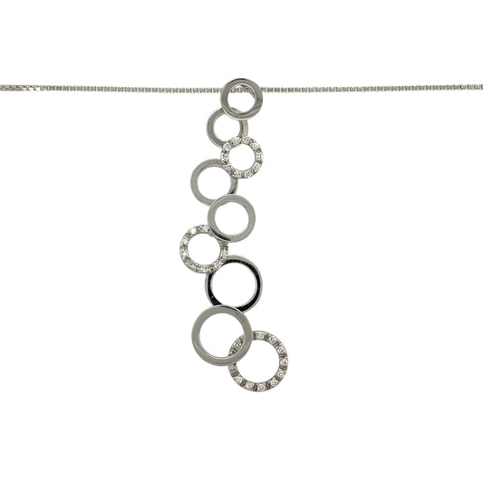 Add modern elegance and graceful movement to your jewellery collection with this pre-owned 18ct white gold and diamond set circle drop pendant necklace, offering contemporary design with refined sparkle—perfect for special occasions or statement wear.
Design: The necklace features a long drop pendant formed from a series of interconnected circles, all of which are moveable, creating fluid motion and an eye-catching silhouette. The pendant measures approximately 4.7cm in length
