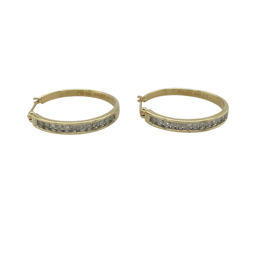 Add refined sparkle and classic elegance to your jewellery collection with this pre-owned 9ct yellow gold diamond hoop creole earrings, offering timeless style with eye-catching brilliance.
Design: These hoop creole earrings feature a classic rounded profile, with diamonds displayed along the front to create a continuous and elegant sparkle when worn.