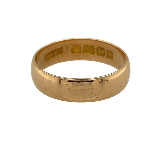Celebrate rich gold tones and timeless simplicity with this pre-owned 22ct yellow gold wedding band ring, offering a classic design with a bold, traditional finish.
Design: This ring features a smooth, plain band with a 5mm profile, giving it a strong and well-balanced appearance that suits everyday wear.
Material: Made from 22-carat yellow gold, the high gold content delivers a rich, warm colour and a distinctive traditional look.