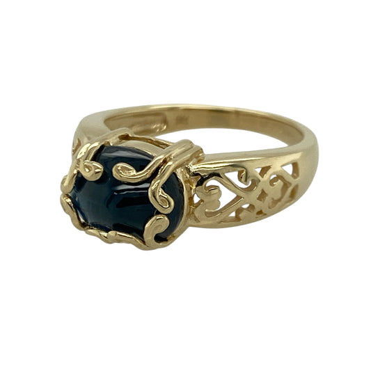 Add flowing elegance and rich colour to your jewellery collection with this pre-owned 9ct yellow gold blue stone swirl detail ring, offering a bold yet graceful design.
Design: This ring features an oval blue stone measuring approximately 7mm by 9mm, framed by a flowing swirl detail that creates movement and visual interest across the front.
Material: Made from 9-carat yellow gold, the warm polished finish beautifully complements the vibrant blue tone of the stone and enhances the fluid design.