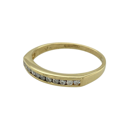 Add sleek elegance to your jewellery collection with this pre-owned 18ct yellow gold diamond channel set band ring, offering refined sparkle within a timeless design. A versatile piece perfect for everyday wear or as a meaningful gift.
Design: The ring features a classic channel set band, with diamonds neatly aligned within the centre of the gold band. With approximately 0.15ct of total diamond content, the stones create a continuous line of subtle brilliance across the front of the ring.