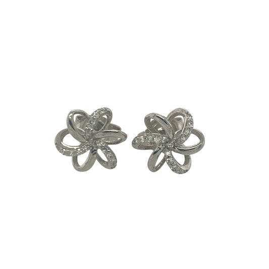 Add delicate sparkle and timeless charm to your jewellery collection with these pre-owned 9ct white gold diamond flower stud earrings, featuring a classic floral designβperfect for everyday wear or special occasions.
Design: The earrings showcase a pretty flower motif set with sparkling diamonds, forming a balanced and elegant shape. The front of each earring measures approximately 8mm, offering a noticeable yet refined presence.