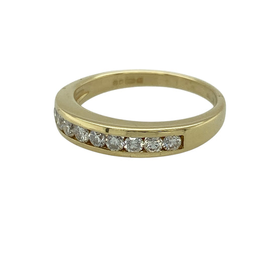 Add classic elegance and refined sparkle to your jewellery collection with this pre-owned 18ct yellow gold diamond set band ring—an elegant and versatile piece perfect for everyday wear or special occasions.
Design: This band ring features a sleek 4mm wide front, set with sparkling diamonds that create a clean and timeless look across the finger.
Material: Made from 18-carat yellow gold, the polished finish enhances the rich golden tone while complementing the brilliance of the diamonds.