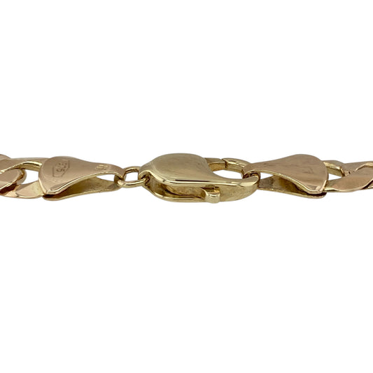 Make a bold and distinctive statement with this pre-owned 9ct rose gold curb bracelet featuring a yellow gold clasp—an eye-catching piece that combines classic design with a unique two-tone finish.
Design: This 8.5" bracelet features traditional curb links, closely interlocked to create a smooth and structured look. The substantial 9mm width gives it a strong and commanding presence on the wrist.