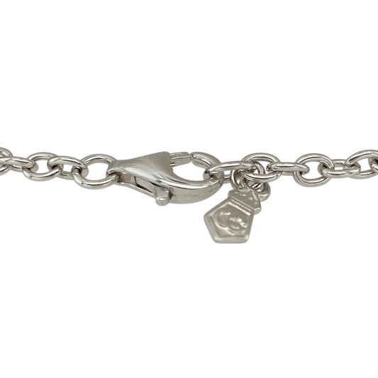 Add a meaningful and elegant touch to your jewellery collection with this pre-owned 925 silver and 9ct gold Clogau Tree of Life heart charm braceletβan eye-catching piece full of symbolism and charm.
Design: This bracelet features a 7.5" belcher link chain with heart-shaped links, complemented by an open heart charm showcasing the iconic Tree of Life design, creating a beautifully coordinated and feminine look.