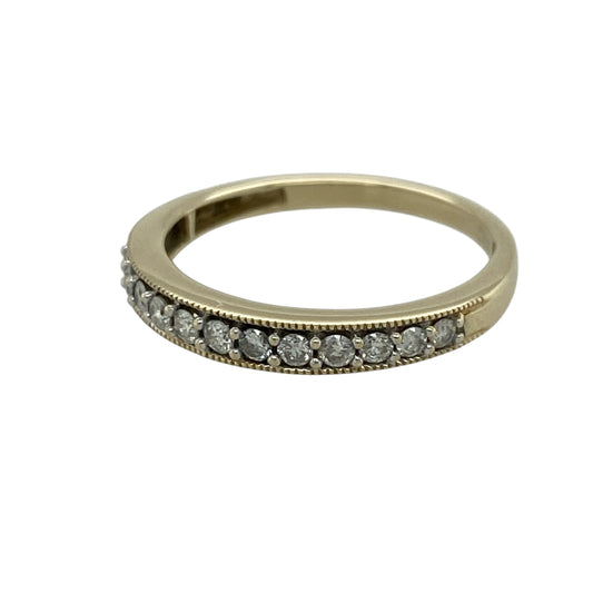 Add refined sparkle to your jewellery collection with this pre-owned 9ct yellow gold diamond set band ring, featuring a classic design with impressive brilliance—perfect for everyday wear or special occasions.
Design: The ring features a sleek band set with diamonds totalling approximately 0.31ct, offering a noticeable and elegant line of sparkle across the front.
Material: Made from 9ct yellow gold, the polished finish enhances the warm tone of the metal while complementing the brilliance of the diamonds.