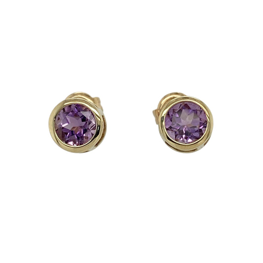 Add a touch of rich colour to your jewellery collection with these pre-owned 9ct yellow gold amethyst stud earrings, featuring a classic design and elegant simplicity—perfect for everyday wear or subtle statement styling.
Design: The earrings feature round amethyst stones measuring approximately 7mm in diameter each, showcasing deep purple tones with a smooth and eye-catching finish.