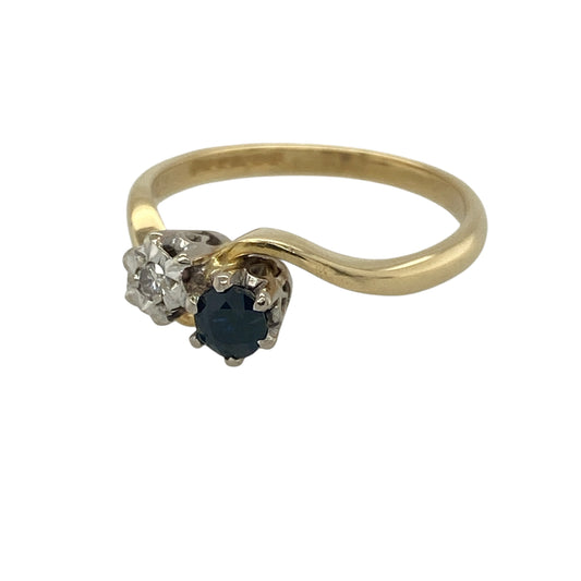 Add timeless elegance and subtle sparkle to your collection with this pre-owned 18ct yellow gold diamond and sapphire set twist ring—an effortlessly stylish piece with classic appeal.
Design: The ring features a 4mm round sapphire, complemented by an illusion-style diamond that enhances its brilliance, all set within a graceful twist design that adds movement and visual interest.