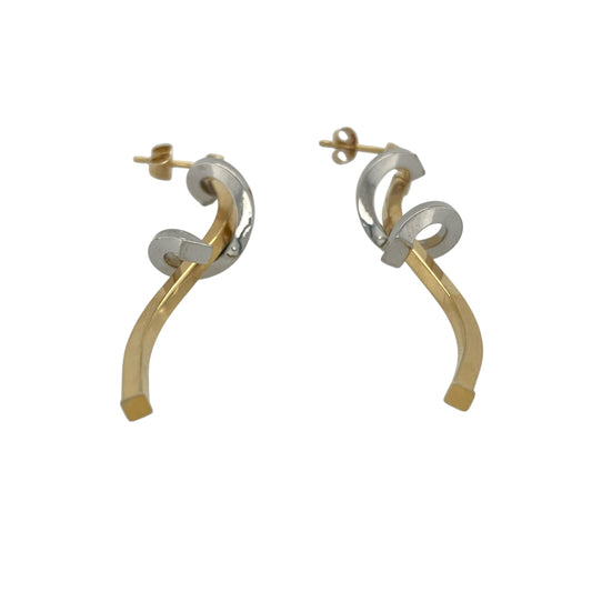 Add elegant movement and contemporary style to your collection with these pre-owned 9ct yellow and white gold spiral drop earrings—an eye-catching pair with a modern twist.
Design: The earrings feature a flowing spiral drop design, creating a sense of movement and fluidity that catches the light beautifully.
Material: Made from 9-carat yellow and white gold, the two-tone finish enhances the spiral shape while adding contrast and visual interest.