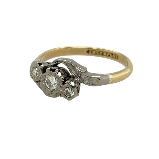 Add refined elegance and mixed-metal luxury to your collection with this pre-owned 18ct yellow gold and platinum diamond set twist trilogy ring—an eye-catching piece with timeless appeal.
Design: The ring features a twist trilogy design with a front measuring approximately 9mm in height, set with sparkling diamonds arranged in a flowing formation that creates movement and brilliance.