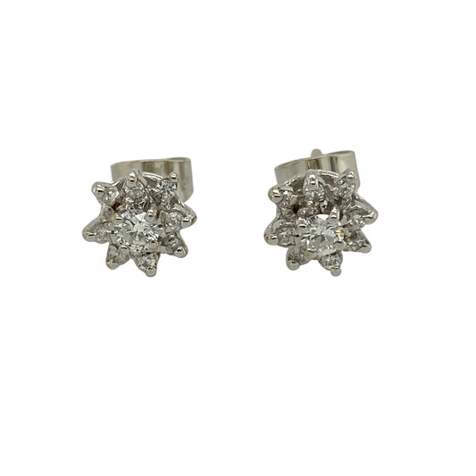 Add timeless sparkle and refined elegance to your collection with these pre-owned 18ct white gold diamond set cluster stud earringsβan effortlessly stylish pair with classic appeal.
Design: The earrings feature a cluster arrangement of sparkling diamonds, creating the illusion of a larger centrepiece while maximising brilliance and shine.
Material: Made from 18-carat white gold, the polished finish enhances the cool tone of the metal while complementing the brightness of the diamonds.