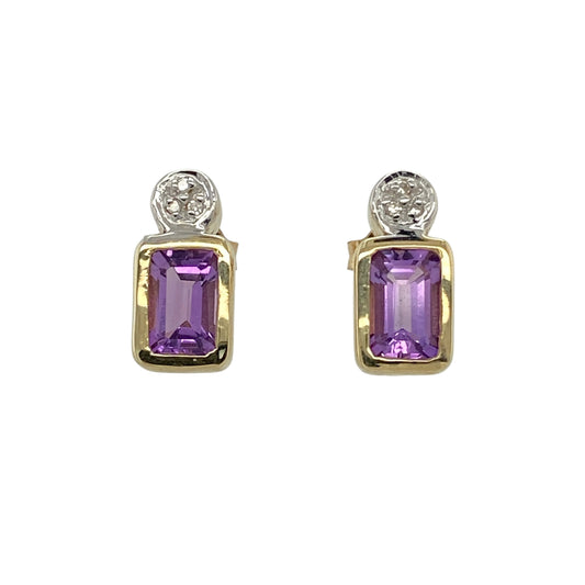 Add a touch of rich colour and elegant sparkle to your collection with these pre-owned 9ct yellow gold diamond and amethyst set stud earrings—an eye-catching pair with timeless appeal.
Design: The earrings feature rectangular amethyst gemstones, each measuring approximately 6mm by 4mm, complemented by sparkling diamond accents that enhance their vibrant purple tone.