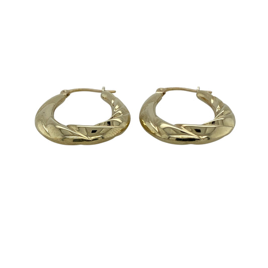Bring timeless style with a contemporary twist to your collection with these pre-owned 9ct yellow gold twisted oval creole earrings, offering elegant shape and subtle texture—perfect for everyday wear or effortless styling.
Design: The earrings feature an oval creole shape with a twisted design, adding dimension and visual interest while maintaining a classic hoop-inspired look.