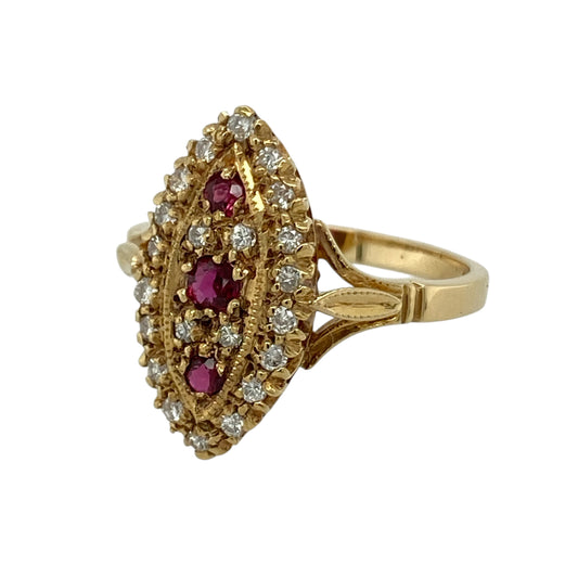Bring striking colour and vintage-inspired elegance to your collection with this pre-owned 18ct yellow gold diamond and ruby marquise ring, featuring a bold elongated design and rich gemstone contrast—perfect for special occasions or standout styling.
Design: The ring features an eye-catching marquise-shaped front measuring approximately 19mm in height, set with vibrant rubies and sparkling diamonds arranged in an elegant, elongated formation.