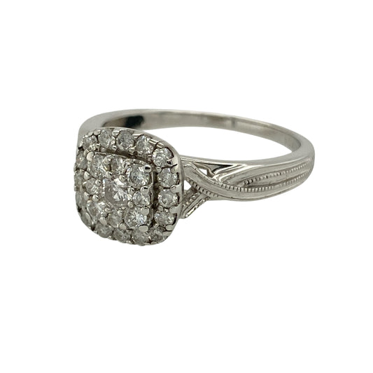 Bring bold sparkle and modern elegance to your collection with this pre-owned 9ct white gold diamond square cluster ring, featuring a striking design with impressive brilliance—perfect for special occasions or standout everyday wear.
Design: The ring showcases a square cluster front measuring approximately 10mm in height, set with multiple diamonds to create a full and eye-catching surface of continuous sparkle.
