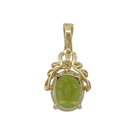 Bring fresh colour and elegant sparkle to your collection with this pre-owned 9ct yellow gold diamond and peridot set pendant, featuring a vibrant centre stone and timeless appealβperfect for everyday wear or special occasions.
Design: The pendant showcases a 10mm by 8mm oval peridot at the centre, complemented by sparkling diamond accents that enhance its bright green hue and create a balanced, eye-catching look.