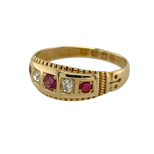 Bring vintage-inspired elegance and rich colour to your collection with this pre-owned 18ct yellow gold diamond and ruby set band ring, featuring a bold design with timeless appeal—perfect for everyday wear or special occasions.
Design: The ring features a band style with a front width of approximately 7mm, set with alternating diamonds and rubies to create a balanced and eye-catching look with classic charm.