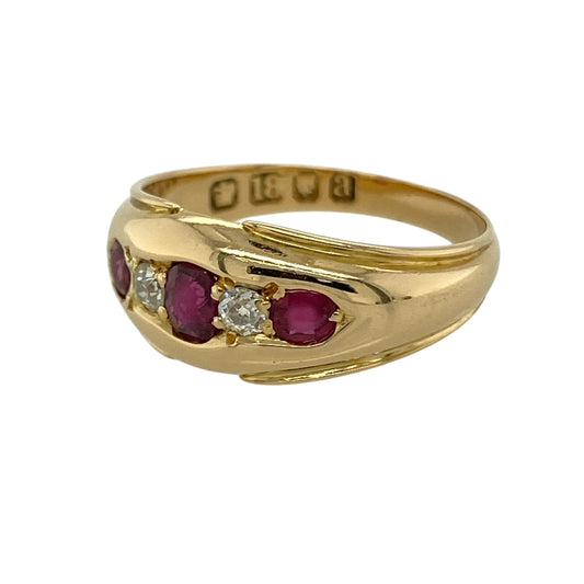 Bring vintage-inspired elegance and rich colour to your collection with this pre-owned 18ct yellow gold diamond and ruby band ring, featuring a bold design with timeless appeal—perfect for special occasions or standout everyday wear.
Design: The ring features a vintage style band with a front width of approximately 8mm, set with three rubies and two diamonds, creating a striking and balanced arrangement with classic character.