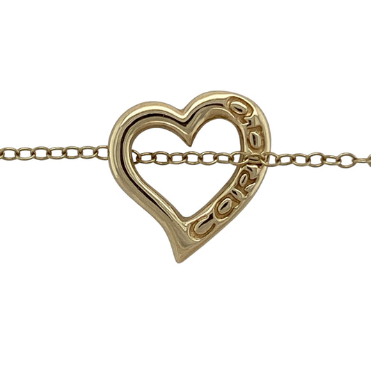 Bring romantic symbolism and timeless Welsh charm to your collection with this pre-owned 9ct yellow gold Clogau Open Cariad heart pendant necklace, featuring an elegant design with meaningful appeal—perfect for everyday wear or a heartfelt gift.
Design: The pendant showcases an open heart design from the Clogau Cariad collection, measuring approximately 17mm by 18mm, suspended from an 18" belcher chain for a classic and balanced finish.