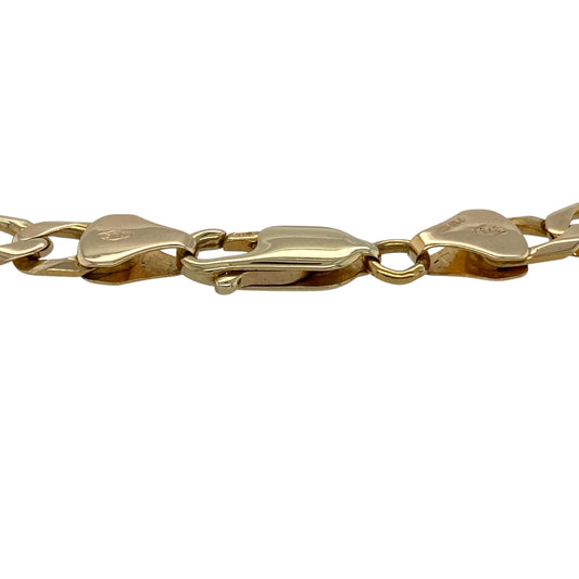 Bring bold style and timeless appeal to your collection with this pre-owned 9ct yellow gold curb bracelet, featuring a substantial design with classic versatilityβperfect for everyday wear or layering with other jewellery.
Design: The bracelet features a traditional curb link pattern with a width of approximately 5mm, creating a strong and eye-catching look with smooth interlocking links.