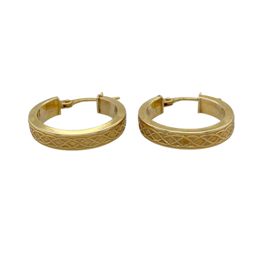 Add timeless Celtic-inspired style to your jewellery collection with these pre-owned 9ct yellow gold Celtic weave hoop creole earrings, featuring intricate woven detailing and a classic hoop design—perfect for everyday wear or adding a touch of heritage-inspired elegance to any outfit.
Design: The earrings feature a traditional hoop creole style with detailed Celtic weave patterning throughout, creating an eye-catching and elegant textured appearance.