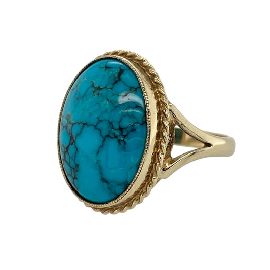 Add vibrant vintage-inspired style to your jewellery collection with this pre-owned 9ct yellow gold turquoise ring, featuring a bold oval gemstone with classic rope detail—perfect for statement wear, special occasions, or everyday elegance.
Design: The ring showcases a striking oval turquoise coloured stone measuring approximately 16mm by 12mm, framed by an elegant rope style surround that adds texture and timeless character to the design.