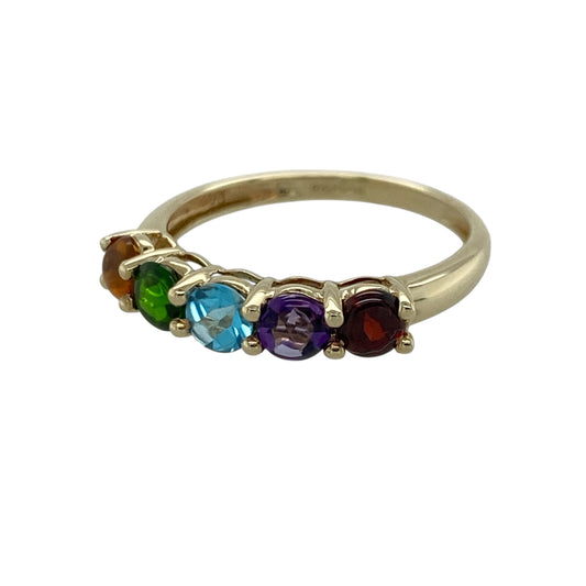 Add vibrant colour and cheerful elegance to your jewellery collection with this pre-owned 9ct yellow gold multi gemstone rainbow band ring, featuring a beautiful array of colourful gemstones with timeless everyday appeal—perfect for stacking, gifting, or adding a pop of colour to any outfit.
Design: The ring features a row of colourful gemstones, each measuring approximately 4mm, arranged in a rainbow-inspired design.