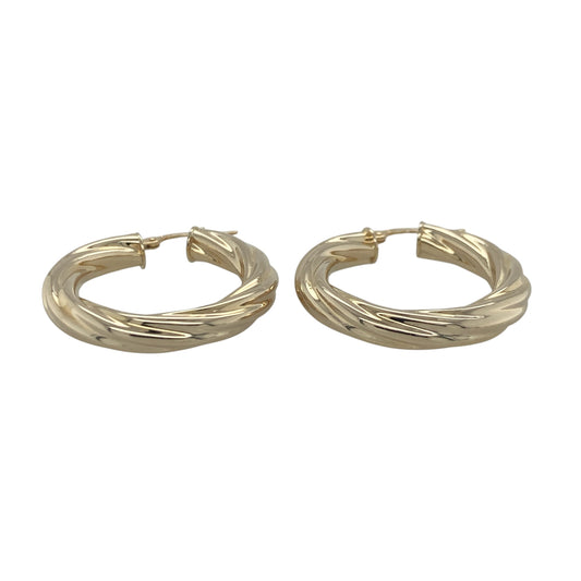 Add timeless elegance to your jewellery collection with these pre-owned 9ct yellow gold twisted hoop creole earrings, featuring a classic design with beautiful texture and versatile everyday appeal—perfect for special occasions, gifting, or effortless daily wear.
Design: The earrings feature a stylish twisted hoop creole design that catches the light beautifully from every angle.