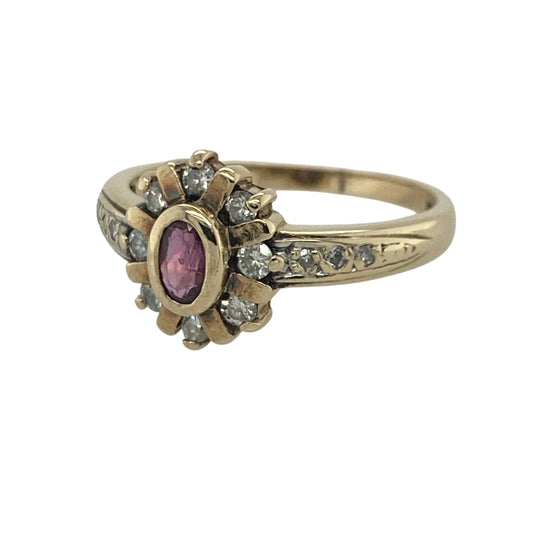 Add timeless elegance and rich colour to your jewellery collection with this pre-owned 9ct yellow gold diamond and ruby cluster ring, featuring a classic gemstone design with sophisticated everyday appeal—perfect for special occasions, gifting, or refined daily wear.
Design: The ring showcases a beautiful oval ruby measuring approximately 5mm by 3mm, surrounded by a cluster of sparkling diamonds that enhance the vibrant red colour of the centre stone.