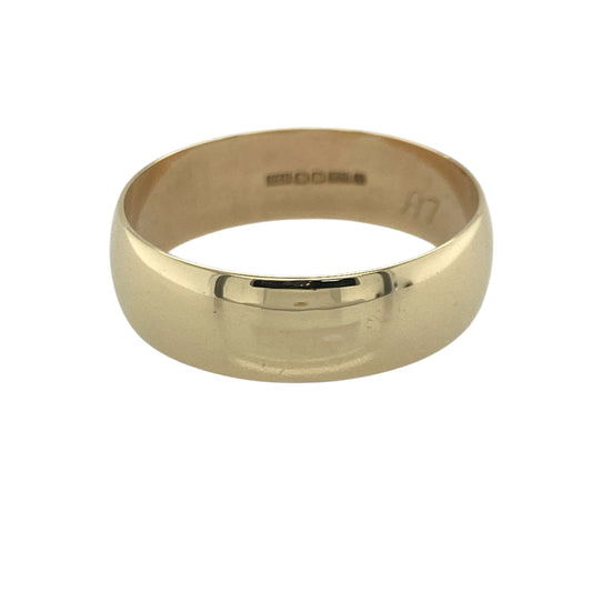 Celebrate timeless commitment with this pre-owned 9ct yellow gold wedding band ring, featuring a classic and elegant design with enduring everyday appeal—perfect as a wedding ring, anniversary band, or a versatile addition to any jewellery collection.
Design: The ring features a traditional polished wedding band profile measuring approximately 7mm wide, offering a bold and distinguished appearance.