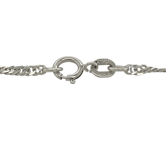 Add timeless elegance and delicate sparkle to your jewellery collection with this pre-owned 9ct white gold Singapore bracelet, featuring a beautifully twisted design with refined everyday appeal—perfect for gifting, layering, or effortless daily wear.
Design: The bracelet features the distinctive Singapore link pattern measuring approximately 2mm wide, with an elegant twisted construction that creates a fluid, light-catching effect and beautiful sparkle with movement.