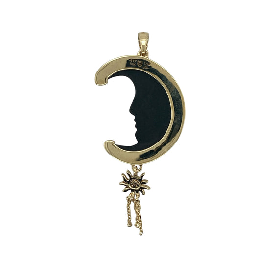 Add celestial charm and distinctive elegance to your jewellery collection with this pre-owned 9ct gold diamond crescent moon pendant, featuring a striking symbolic design with unique statement appeal—perfect for special occasions, gifting, or lovers of mystical and celestial jewellery.
Design: The pendant showcases a large crescent moon design formed from a striking black stone, beautifully detailed with a sculpted facial profile for a truly distinctive appearance.