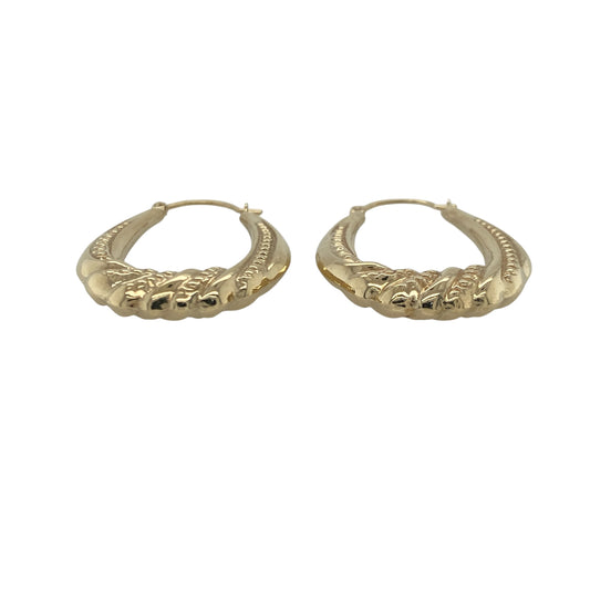 Add timeless elegance and decorative detail to your jewellery collection with these pre-owned 9ct yellow gold twisted patterned oval creole earrings, featuring a classic design with versatile everyday appeal—perfect for gifting, daily wear, or complementing any jewellery collection.
Design: The earrings feature an elegant oval creole shape enhanced with attractive twisted and patterned detailing, creating a beautiful combination of texture and light-catching sparkle.