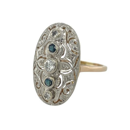 Make a striking statement with this pre-owned 14ct yellow and white gold diamond and sapphire oval dress ring, featuring an impressive design with luxurious sparkle and timeless elegance—perfect for special occasions, formal wear, or adding a standout piece to your jewellery collection.
Design: The ring showcases a dramatic oval-shaped dress ring design measuring approximately 24mm high at the front, creating an eye-catching presence on the hand.