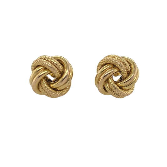 Add a touch of timeless elegance to your jewellery collection with these pre-owned 9ct yellow gold patterned knot stud earrings, featuring a classic design with enduring appeal—perfect for everyday wear, gifting, or special occasions.
Design: The earrings showcase beautifully crafted knot motifs measuring approximately 10mm in diameter.
