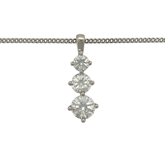 Add elegant sparkle and contemporary style to your jewellery collection with this pre-owned 9ct white gold cubic zirconia three stone drop pendant necklace. Featuring a graceful vertical arrangement of sparkling stones, this eye-catching piece offers timeless sophistication for both everyday wear and special occasions.
Design: The pendant showcases three cubic zirconia stones arranged in an elegant drop formation, creating movement and brilliance as they catch the light.