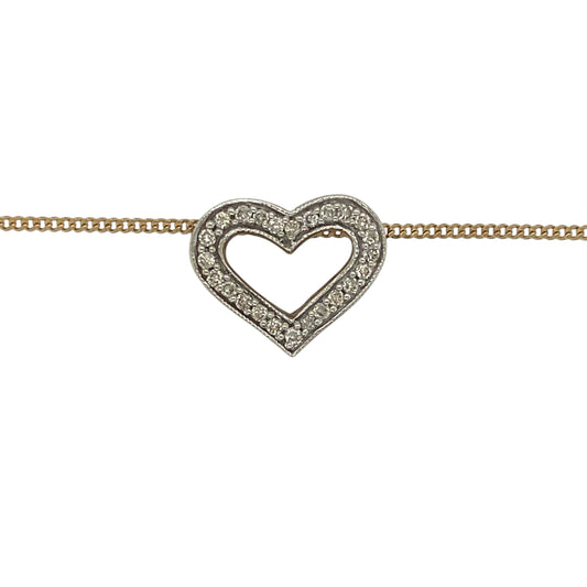A beautiful symbol of love and affection, this pre-owned 9ct yellow gold diamond open heart pendant necklace combines timeless elegance with delicate sparkle. Featuring a classic heart design accented with diamonds, this necklace is perfect for everyday wear or as a meaningful gift for someone special.
Design: The necklace features an elegant open heart pendant measuring approximately 16mm by 13mm.