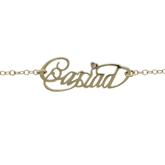 Celebrate Welsh heritage and timeless elegance with this pre-owned 9ct yellow and rose gold Clogau Cariad diamond necklace, featuring the iconic Cariad design accented with sparkling diamonds—perfect for everyday wear or as a meaningful gift.
Design: The necklace features the distinctive Clogau Cariad plate measuring approximately 30mm by 11mm, showcasing the elegant and instantly recognisable design.