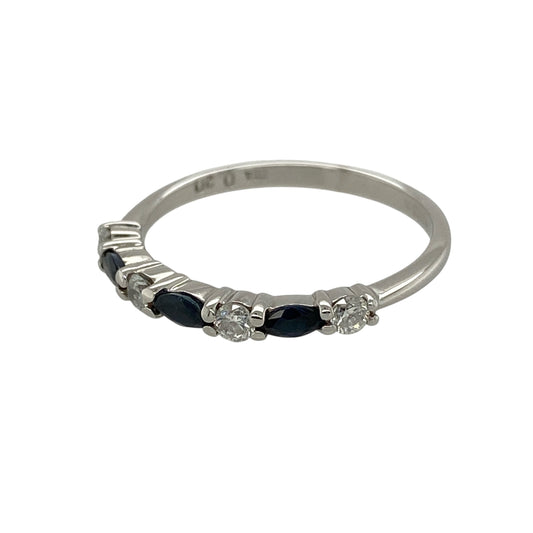 Add timeless elegance and vibrant colour to your jewellery collection with this pre-owned 9ct white gold diamond and sapphire band ring, featuring marquise-cut sapphires complemented by sparkling diamonds—perfect for everyday luxury or special occasions.
Design: The ring showcases elegant marquise-cut sapphires, each measuring approximately 4mm by 2mm, beautifully complemented by sparkling diamonds.