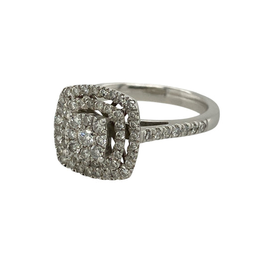 Make a dazzling statement with this pre-owned 9ct white gold diamond square double halo cluster ring, featuring a luxurious multi-layered design with sparkling diamond-set shoulders.
Design: The ring showcases a stunning square-shaped diamond cluster surrounded by a double halo of brilliant diamonds, creating exceptional sparkle and the illusion of a larger centrepiece.
