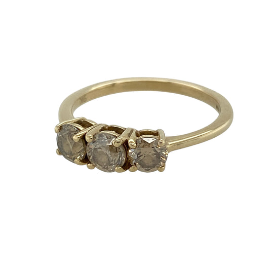 Add warmth, elegance and distinctive sparkle to your jewellery collection with this pre-owned 9ct yellow gold champagne diamond trilogy ring, featuring three beautifully matched diamonds in a timeless setting.
Design: The ring showcases a classic trilogy design with three champagne diamonds arranged across the centre, symbolising the past, present and future. The elegant setting offers a timeless appearance that makes the ring suitable for everyday wear or as a meaningful gift for a special occasion.