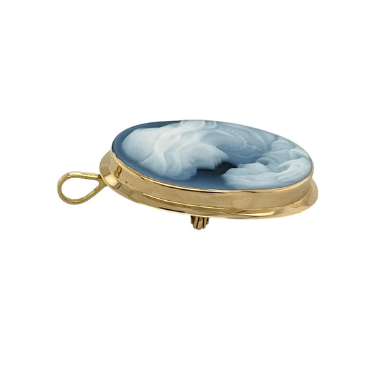 Add vintage-inspired elegance and sentimental charm to your jewellery collection with this pre-owned 9ct yellow gold and blue cameo oval pendant and brooch, featuring a beautifully detailed mother and child portrait.
Design: The piece showcases a classic oval cameo design depicting a mother and child, creating a meaningful and timeless focal point.