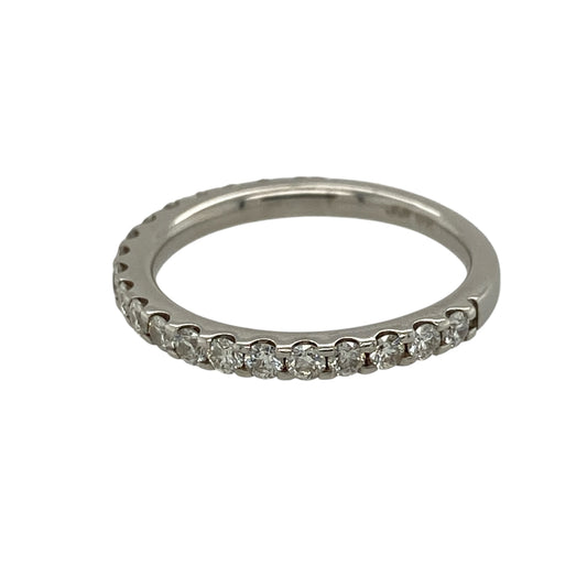 Add timeless elegance and refined sparkle to your jewellery collection with this pre-owned 18ct white gold and diamond half eternity band ring, featuring a classic design with substantial diamond content.
Design: The ring showcases a traditional half eternity design with diamonds set across the front section of the band, creating an elegant line of sparkle and a timeless appearance suitable for everyday wear or special occasions.