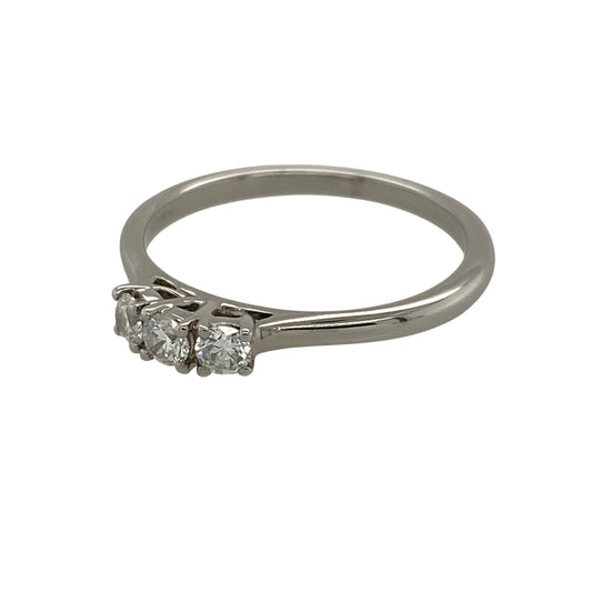 Add timeless elegance and meaningful sparkle to your jewellery collection with this pre-owned 9ct white gold and diamond trilogy ring, featuring three sparkling diamond sections and approximately 0.30ct of total diamond content—perfect as an engagement ring, anniversary gift, or sophisticated everyday piece.
Design: The ring features a classic trilogy design with three diamond sections creating a balanced and elegant appearance, traditionally representing the past, present, and future.