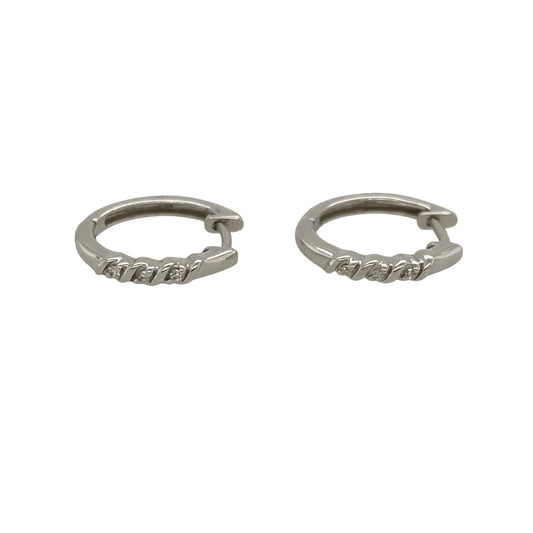 Add timeless sparkle and versatile elegance to your jewellery collection with these pre-owned 9ct white gold and diamond small hoop earrings, featuring a classic design enhanced by sparkling diamond detail—perfect for everyday wear, special occasions, or adding refined sparkle to any outfit.
Design: The earrings feature a classic small hoop design accented with diamonds, creating an elegant and versatile appearance that can be worn alone or paired with other white gold jewellery.