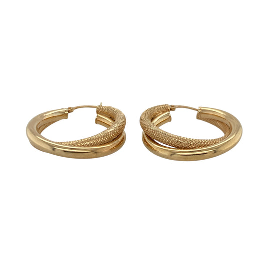 These pre-owned 9ct yellow gold textured double hoop creole earrings combine a classic hoop style with a contemporary layered design, making them a versatile choice for any jewellery collection.
Design: The earrings feature a double hoop creole design with a textured finish that adds depth and catches the light beautifully. Their layered appearance creates the look of two hoops while remaining lightweight and comfortable to wear.