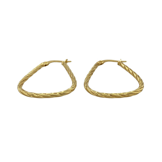 These pre-owned 9ct yellow gold twisted oval creole earrings combine a classic oval shape with an elegant twisted finish, making them a versatile addition to any jewellery collection.
Design: The earrings feature a graceful oval creole design with a polished twisted pattern that catches the light beautifully, offering a timeless look suitable for both everyday wear and special occasions.
Material: Made from 9-carat yellow gold.
