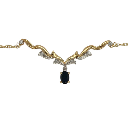 This pre-owned 9ct yellow and white gold diamond and sapphire Y-shaped necklace combines elegant two-tone gold with a timeless sapphire and diamond design.
Design: The necklace features a graceful Y-shaped design in polished yellow and white gold, centred around a vibrant oval sapphire accented by sparkling diamonds. Suspended from an 18-inch chain, it creates an elegant drop effect that is perfect for both everyday wear and special occasions.
Material: Made from 9-carat yellow and white gold.