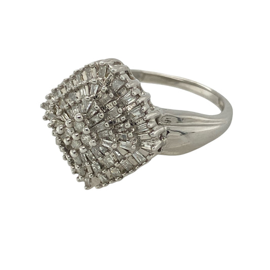 This pre-owned 9ct white gold diamond square cluster ring is a bold and elegant piece, designed to make a sparkling statement.
Design: Featuring a striking square cluster of sparkling diamonds, this eye-catching ring measures approximately 14mm high at the front, creating an impressive presence on the finger. The polished white gold setting enhances the brilliance of the diamonds, making it ideal for special occasions or adding everyday luxury.
Material: Made from 9-carat white gold.