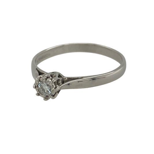 This pre-owned 18ct white gold diamond illusion set solitaire ring is a timeless design, offering elegant sparkle with a classic look.
Design: Featuring an approximate 0.10ct brilliant cut diamond in an illusion setting, this elegant solitaire ring is designed to maximise the appearance and brilliance of the centre stone. The polished white gold setting enhances the diamond's sparkle, making it a beautiful choice as an engagement ring or an everyday piece to treasure.